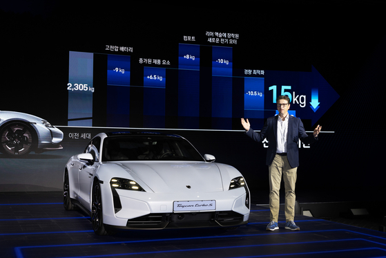 Kevin Giek, vice president of product line limousines at Porsche AG, introduces the new Taycan EV during a media event in central Seoul on Thursday. [PORSCHE KOREA]