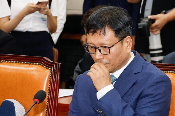 Qoo10 founder and CEO Ku Young-bae attends a hearing at the National Assembly in western Seoul on July 30. [NEWS1]