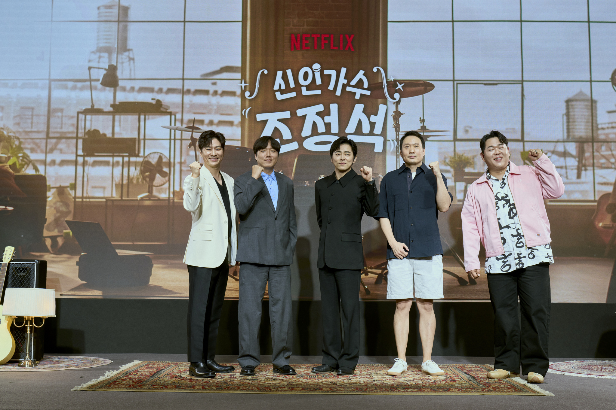 Cast and producers of Netflix upcoming documentary reality show "A-list to Playlist" pose for a photo during a press conference held in Mapo District, western Seoul, on Aug. 27. [NETFLIX]     