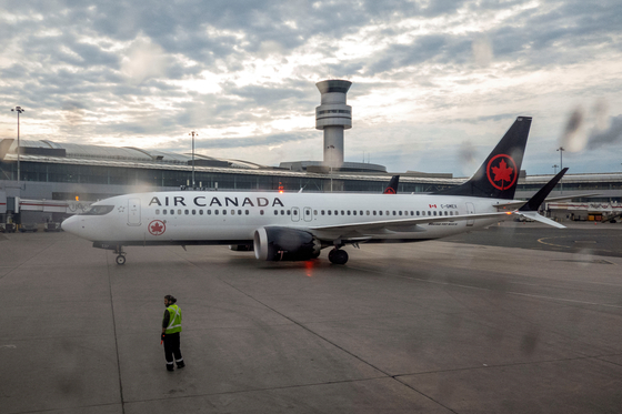 An Air Canada plane taxis at Pearson International Airport in Toronto, Canada in May 2022. [REUTERS]