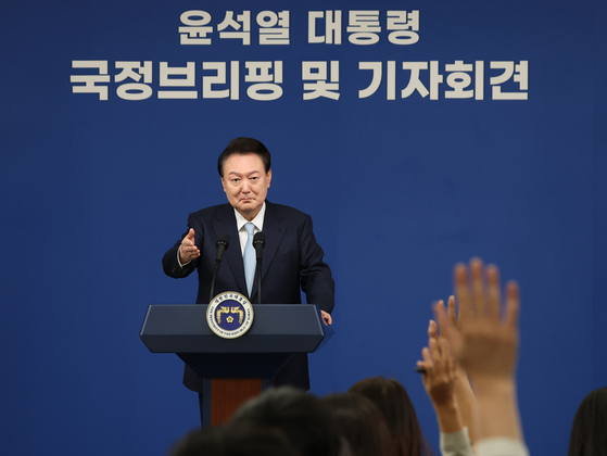 President Yoon Suk Yeol takes a question from a reporter during a press conference at the Yongsan presidential office in central Seoul on Thursday. [NEWS1]