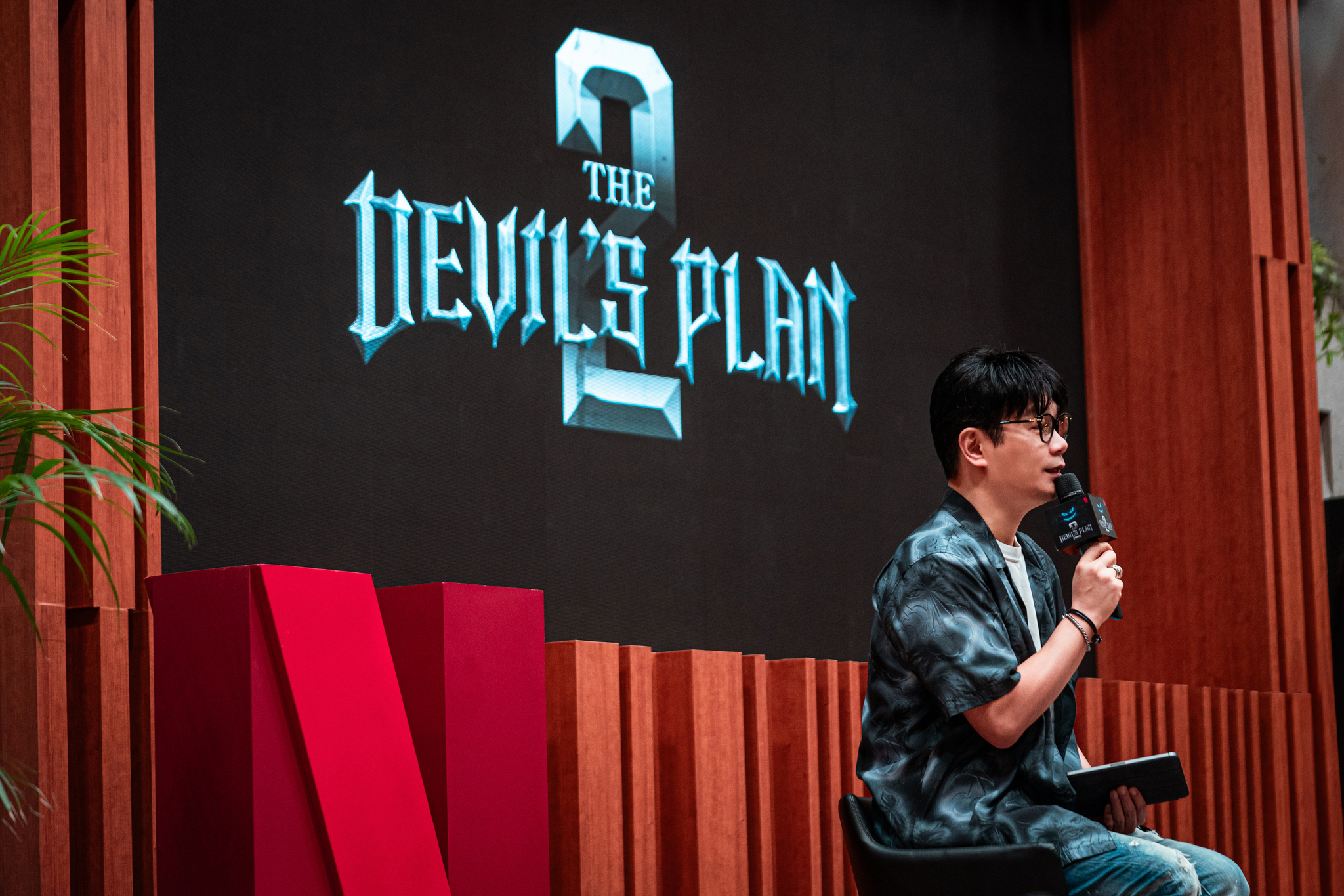 Producer Jeong Jong-yeon speaks during Neflix's reality game show ″The Devil's Plan″ press set visit tour held in Paju, Gyeonggi, on Monday. [NETFLIX]