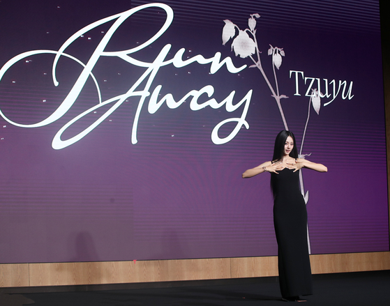 Singer Tzuyu of girl group Twice poses for photos during a press conference held on Sept. 5 in southern Seoul for the release of her first solo album, ″abouTZU.″ [NEWS1]