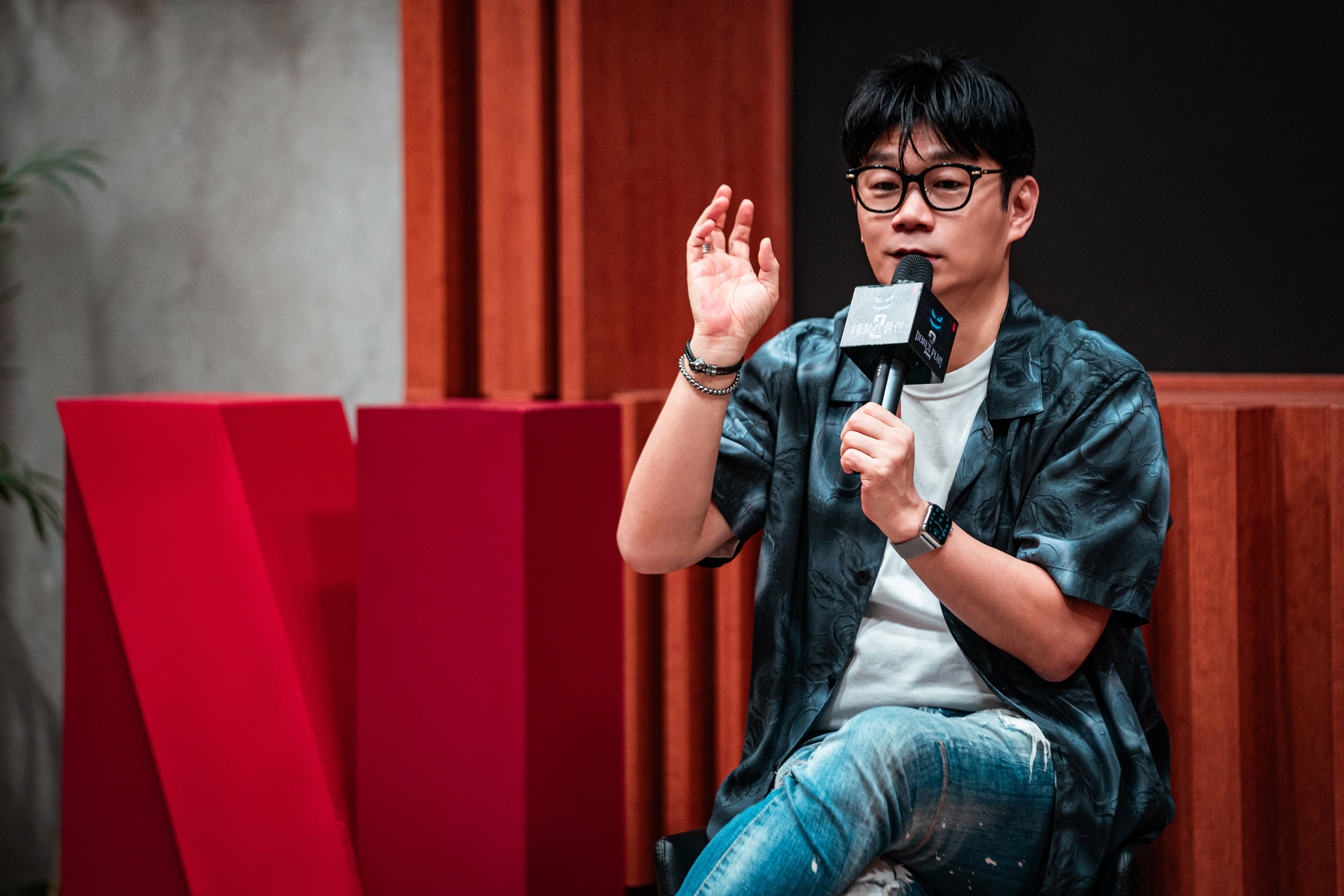 Producer Jeong Jong-yeon speaks during Neflix's reality game show ″The Devil's Plan″ press set visit tour held in Paju, Gyeonggi, on Monday. [NETFLIX]