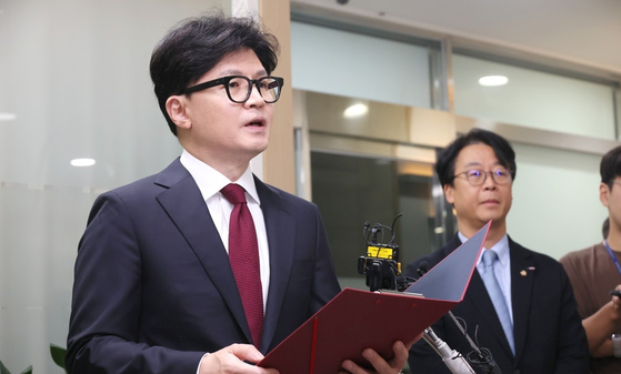 Han Dong-hoon, leader of the conservative People Power Party (PPP), talks at a press briefing held at the Korea Christian Association Building in Jongno District, central Seoul on Friday. [YONHAP]