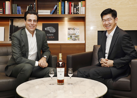  Edrington’s managing director of the North Asian region Martin Jaime and Roh Dong-kyu, founder of D&P Spirits, The Macallan's official importer and distributor in Korea, poses for the camera during an interview with the local press ahead of the launch held at the Bentley Tower in Dongdaemun District, eastern Seoul. [PARK SANG-MOON][PARK SANG-MOON]