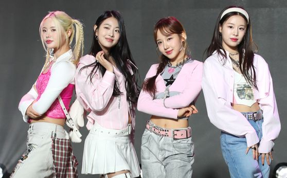 Girl group Fifty Fifty with three of its former members and current member Keena, far left, in April 2023 [NEWS1]