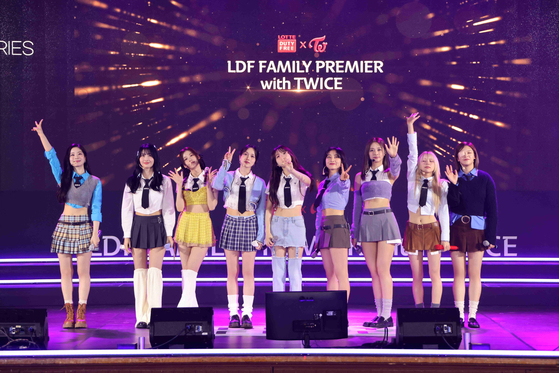 Girl group Twice at its fan meet and greet hosted by Lotte Duty Free at Sejong University in Seoul in February 2023. [LOTTE DUTY FREE]