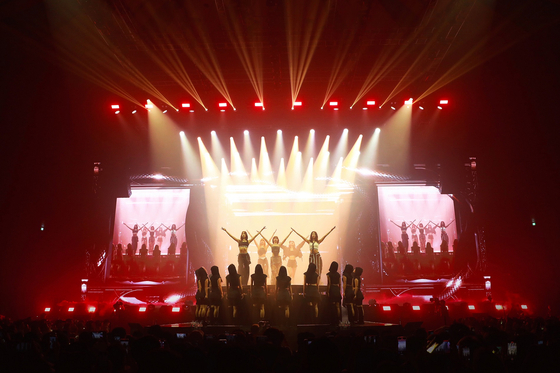 Girl group Le Sserafim during the group's first world tour, ″Flame Rises,″ in August 2023 held at the Jamsil Indoor Stadium. [SOURCE MUSIC]