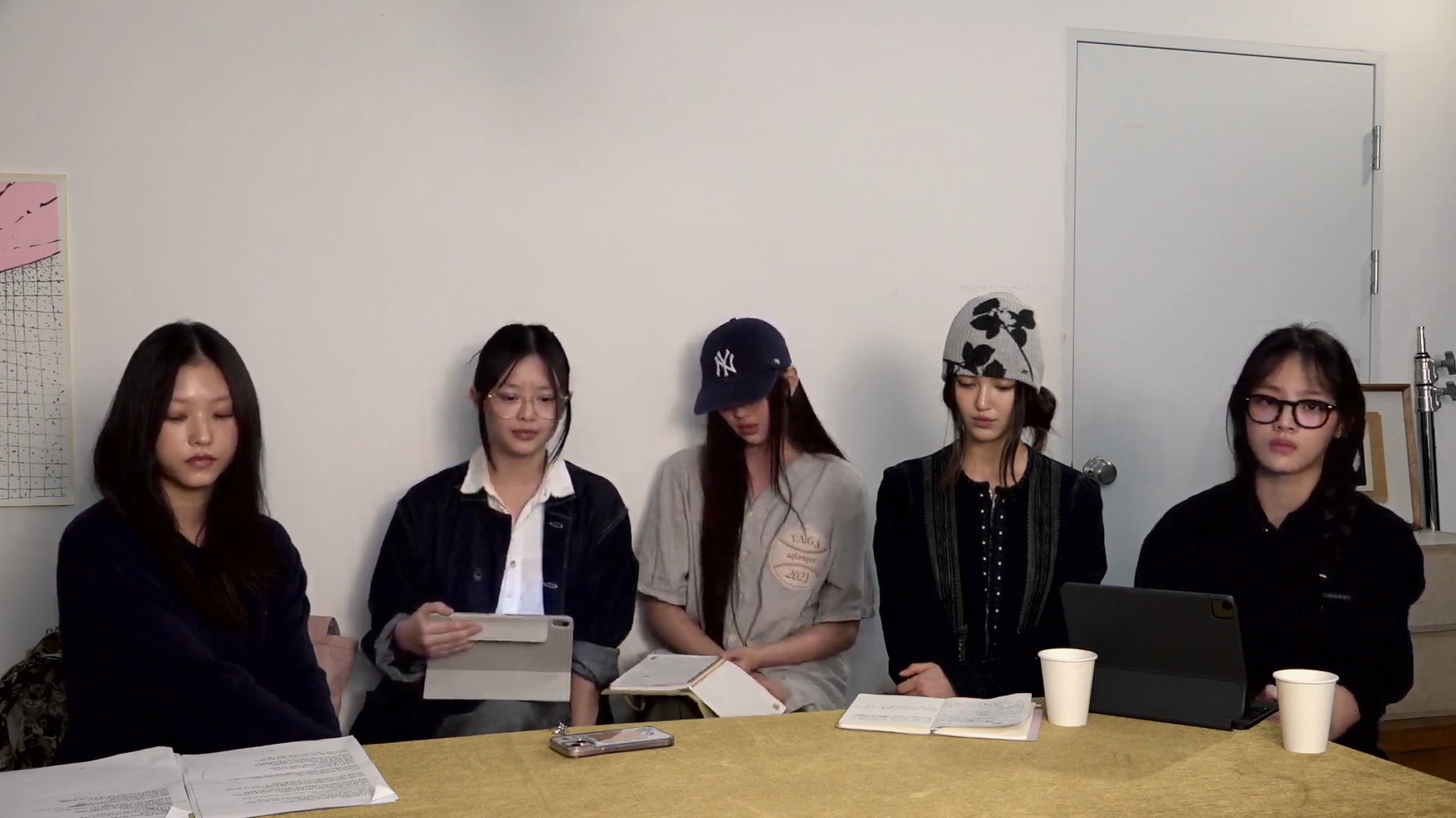 Members of girl group NewJeans hold a YouTube livestream on Sept. 11. [SCREEN CAPTURE]