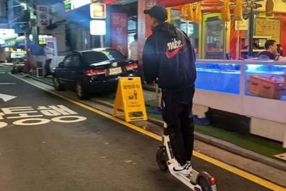 A picture of Jesse Lingard riding an e-scooter that the midfielder posted to his Instagram account on Monday [SCREEN CAPTURE]