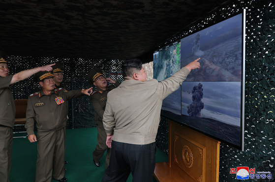 Korean Central News Agency on Thursday reported that North Korea leader Kim Jong-un supervised successful tests of two types of missiles. [YONHAP]