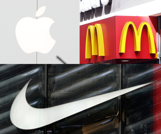 Clockwise from top left are the logos of Apple, McDonald's and Nike [YONHAP, REUTERS]