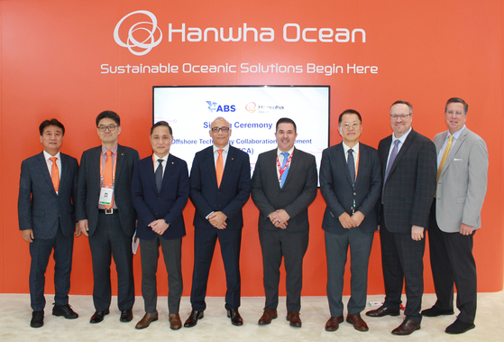 Officials from Hanwha Ocean and the American Bureau of Shipping pose for a photo after signing a partnership during Gastech 2024 in Houston, Texas. [HANWHA OCEAN]