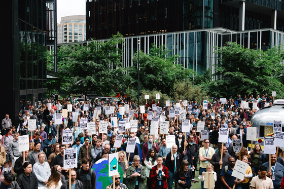 Amazon employees protest a partial return to office mandate at the company’s Seattle headquarters on May 31, 2023. The internet giant told employees on Monday, Sept. 16, 2024, that it expects them to return to the office full-time in January 2025. (Grant Hindsley/The New York Times) 