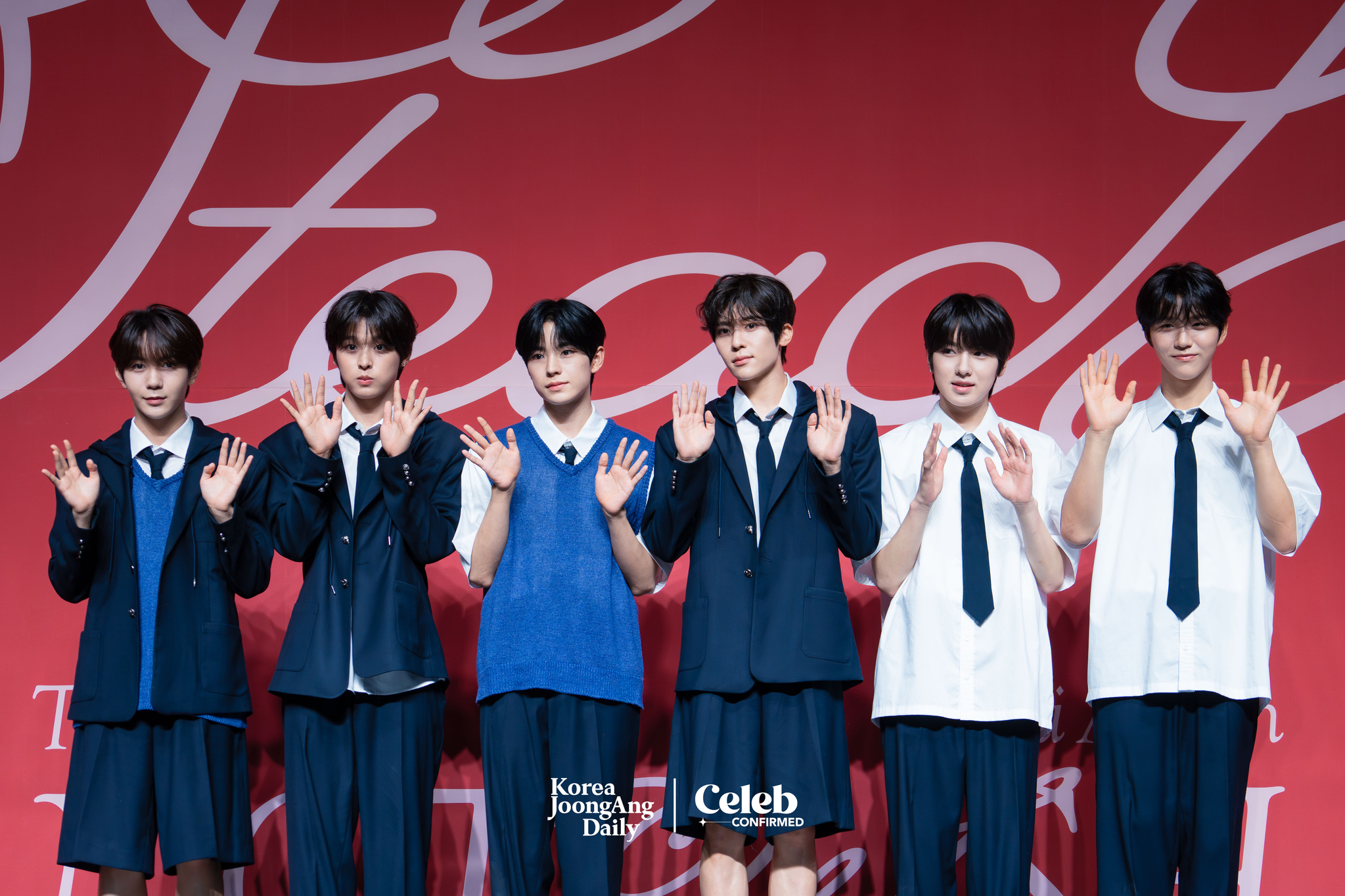 Boy band NCT Wish poses for the cameras during a press showcase held on Tuesday at the Blue Square in central Seoul. [DANIELA GONZALEZ PEREZ]