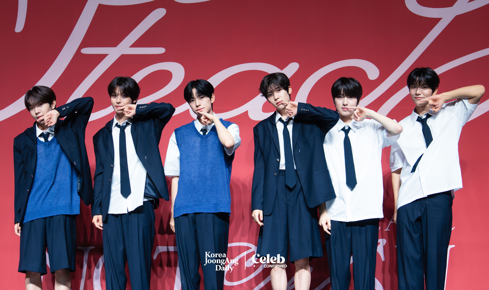 Boy band NCT Wish poses for the cameras during a press showcase held on Tuesday at the Blue Square in central Seoul. [DANIELA GONZALEZ PEREZ]