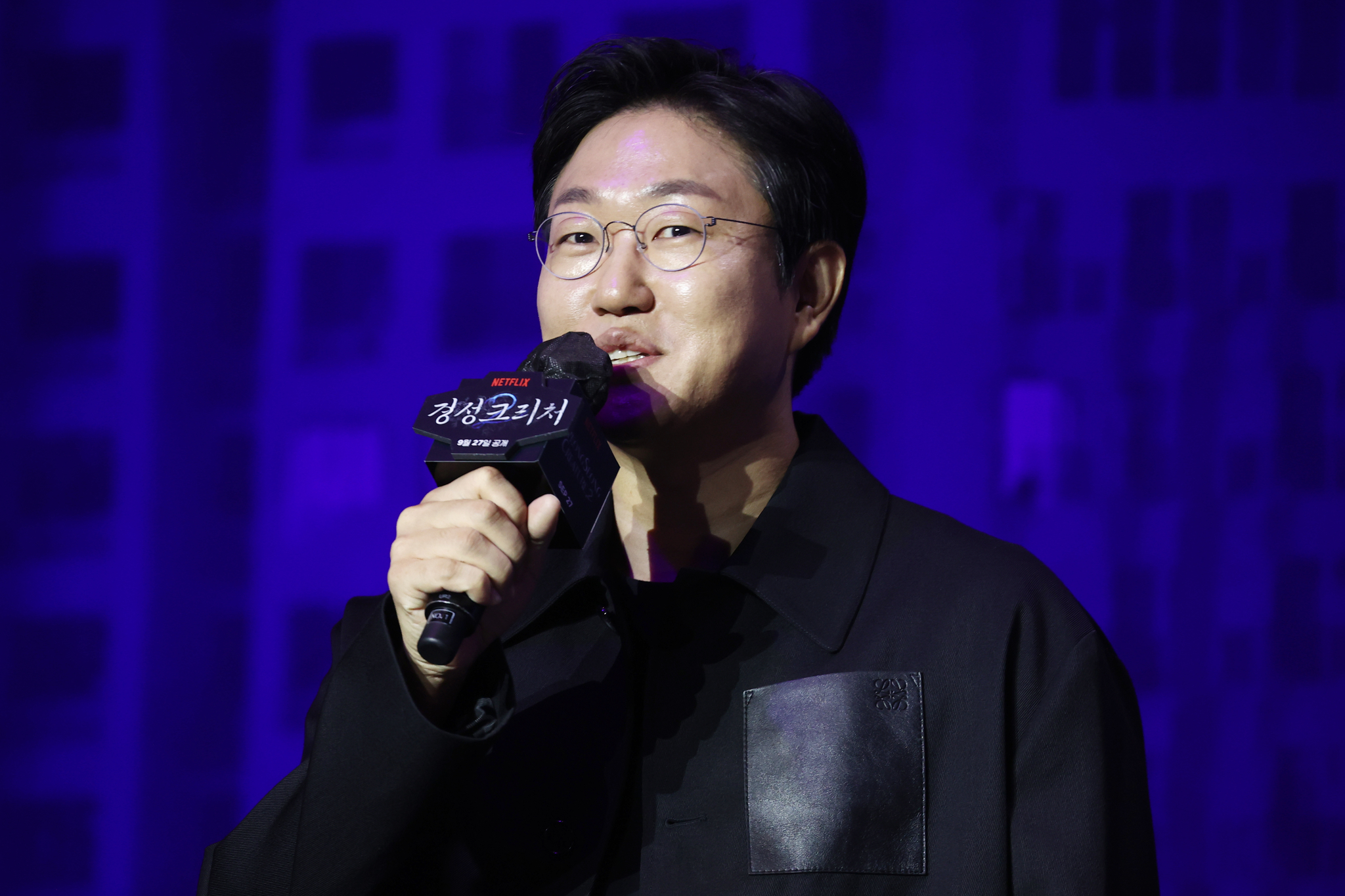 Director Chung Dong-yoon speaks during a press conference held in Yongsan District, central Seoul, on Wenesday for the upcoming second season of Netflix series ″Gyeongseong Creature.″ [YONHAP] 