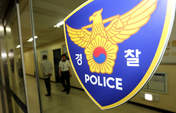 A police logo [JOONGANG PHOTO]