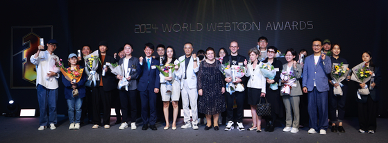 Winners and presenters of the 2024 World Webtoon Awards ceremony held in Seongdong District, eastern Seoul, on Sept. 26. [YONHAP]