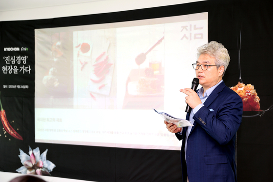 Kyochon BHN Bio CEO Song Won-yeop talks about the company's plans to expand its sauce business at a press tour at the firm's sauce production facility in Jincheon, North Chungcheong, on Sept. 26. [KYOCHON F&B]