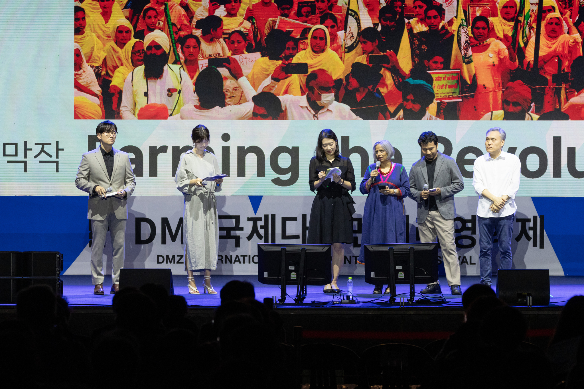 Indian filmmaker Nishtha Jain, third from right, speaks about her film "Farming the Revolution" during the 16th DMZ International Documentary Film Festival.[DMZ DOCS]