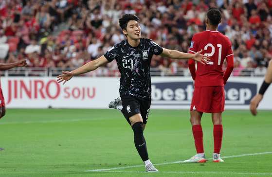 Korea's Bae Jun-ho celebrates during a 2026 World Cup qualifier against Singapore at Singapore National Stadium in Singapore on June 6. [YONHAP] 