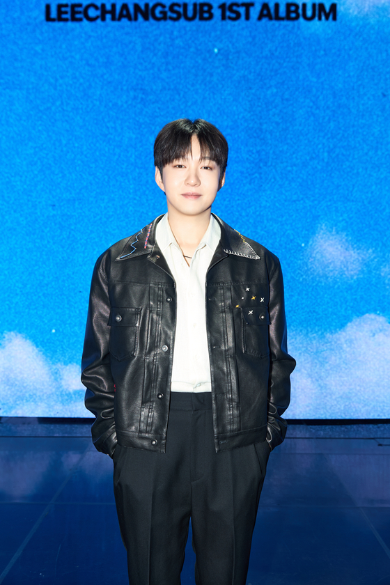 Lee Chang-sub poses for a photo during a press showcase held on Wednesday at the Blue Square in central Seoul. [FANTAGIO]