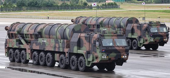 Transporter erector launchers carrying Korea’s secretive Hyunmoo-5 ballistic missiles are revealed for the first time at a ceremony marking the 76th Armed Forces Day at Seoul Air Base in Seongnam, Gyeonggi, Tuesday. [NEWS1]