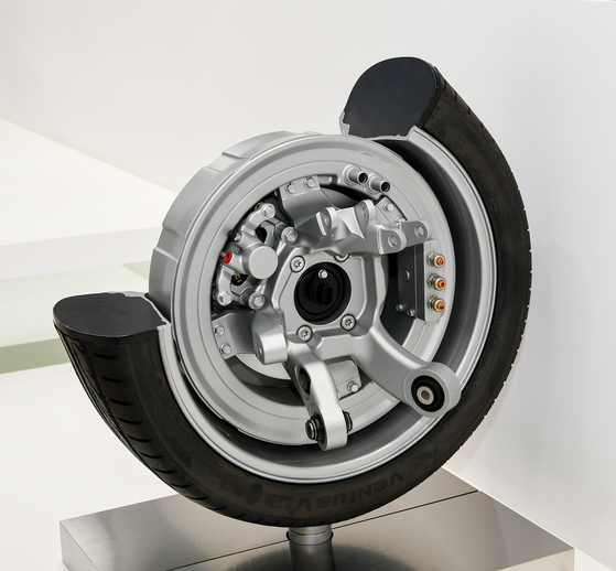 Mobis’s “in-wheel technology” places four small motors inside each wheel and allows cars to "crabwalk" or move sideways, drive diagonally and make pivot turns. [HYUNDAI MOTOR]