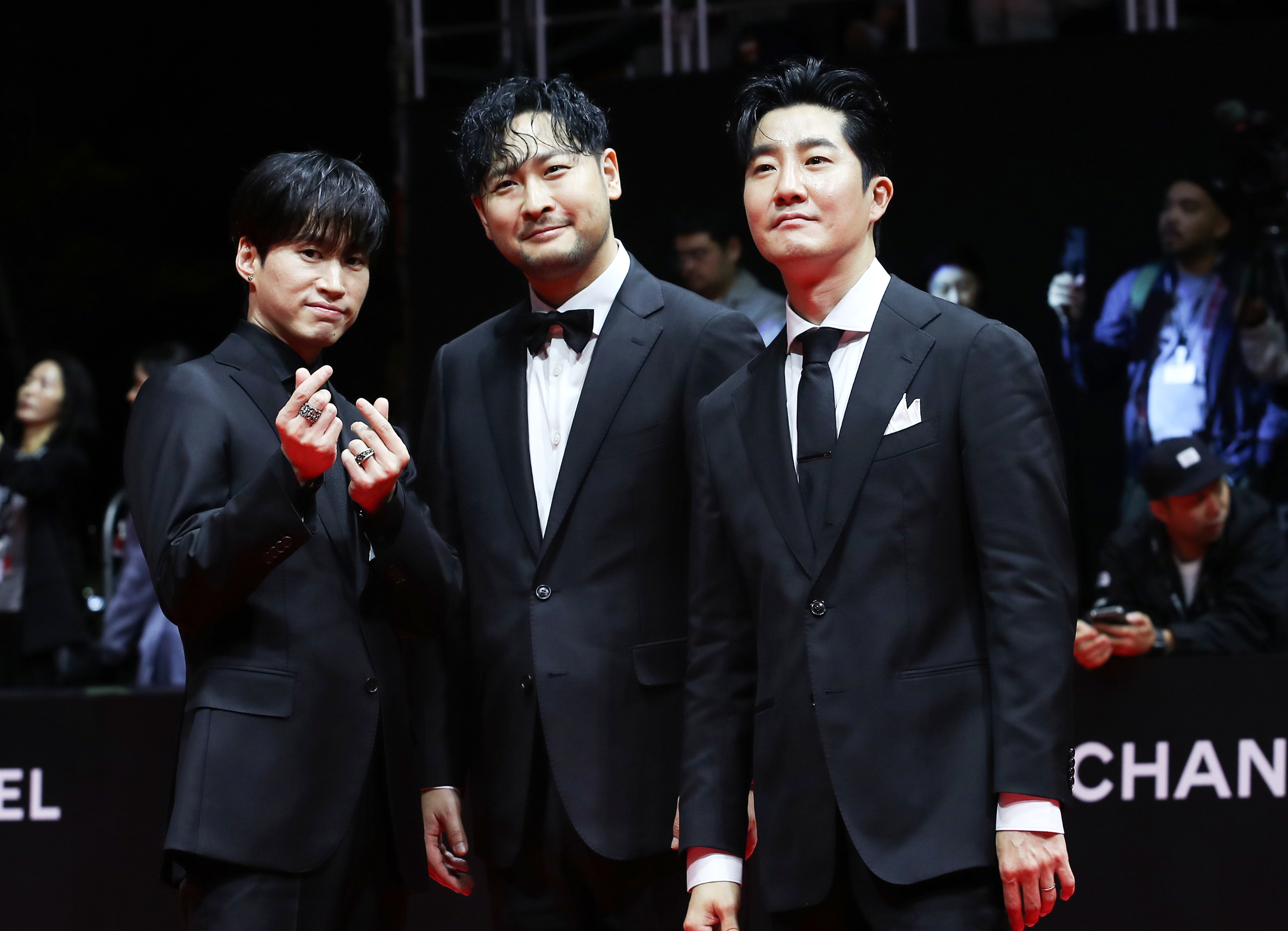 Hiphop trio Epik High poses for a photo during the 29th Busan International Film Festival's red carpet event held at the Busan Cinema Center in Haeundae District on Wednesday. [NEWS1]