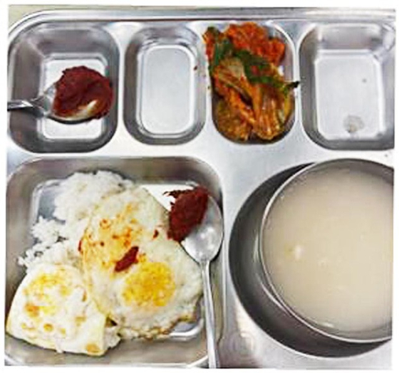 A meal in a fire station in Ulsan [OFFICE OF REP HAN BYUNG-DO]