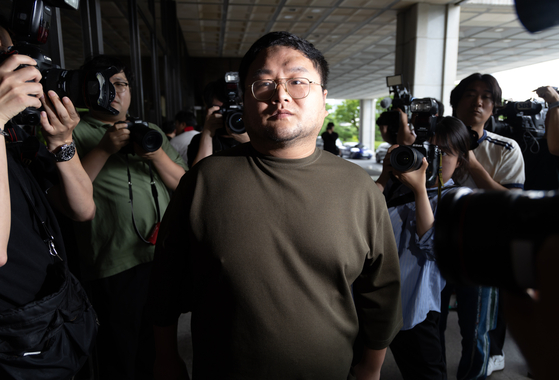 YouTuber GooJeYeok, accused of extorting money by blackmailing her of her past, at the Seoul Central District Prosecutors' Office on July 15 [YONHAP]