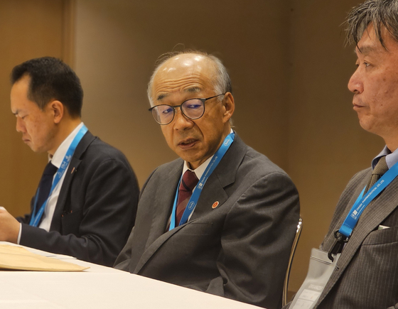 Japan Bioindustry Association Executive Director Yoshiaki Tsukamoto, center, speaks during a press meeting on the sidelines of Bio Japan 2024 in Yokohama on Wednesday. [SHIN HA-NEE]