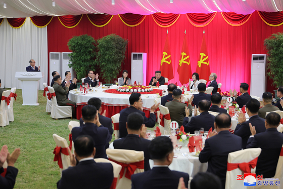 North Korean leader Kim Jong-un, second from right, attends a cultural performance and banquet held on Thursday to celebrate the 79th founding anniversary of the ruling Workers' Party of Korea. [KOREAN CENTRAL NEWS AGENCY]