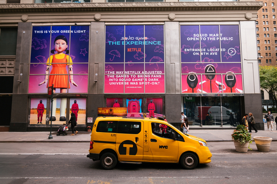 The Manhattan Mall advertises the opening of "Squid Game: The Experience." [YONHAP]