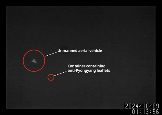 An image of what North Korea claims is a South Korean unmanned aerial vehicle (translated), left, and flyers (translated), right, released by the state-run Korean Central News Agency on Friday. [CHUN YU-JIN]