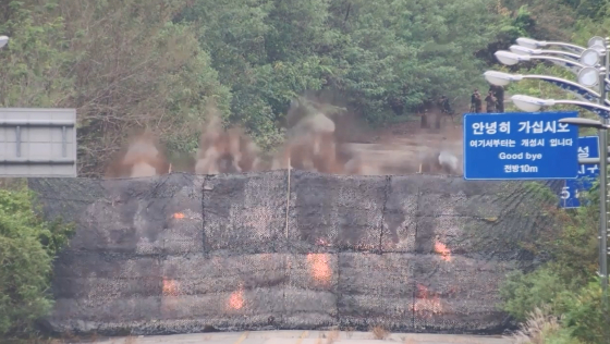 Footage captured by South Korean surveillance cameras shows the road connecting the Gyeongui Line between the South Korean city of Paju and the North Korean city of Kaesong being detonated on Tuesday. [JOINT CHIEFS OF STAFF]