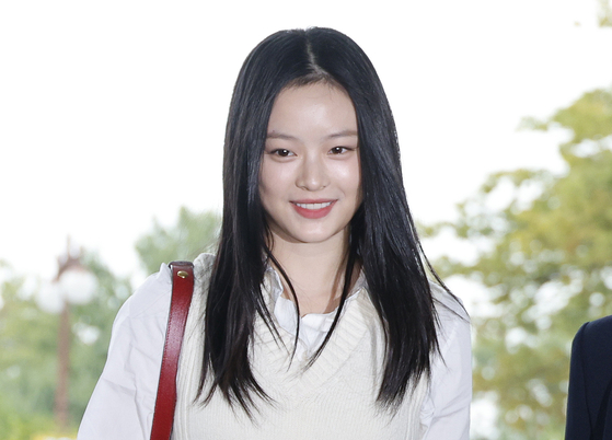 Hanni of girl group NewJeans arrives at the National Assembly in western Seoul to attend a parliamentary audit by the Environment and Labor Committee on Oct. 15. [NEWS1]