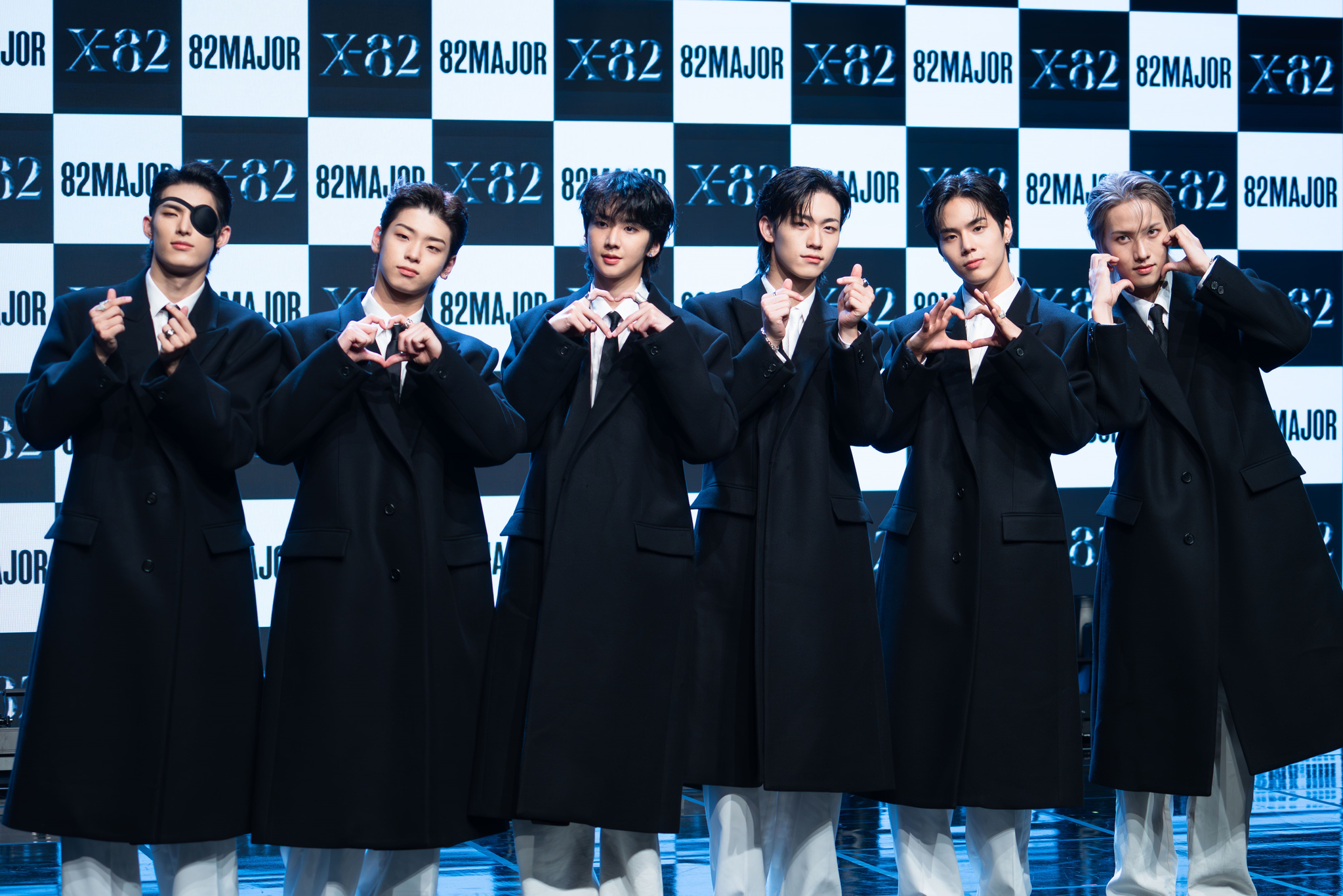 Boy band 82Major members pose for a photo during a showcase on Tuesday at the Ilchi Art Hall in southern Seoul. [DANIELA GONZALEZ PEREZ]