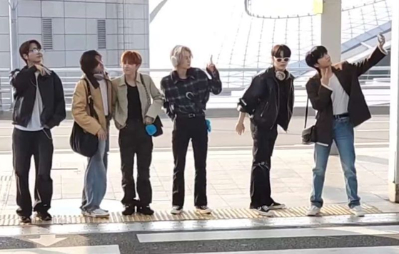 K-pop group BoyNextDoor takes a selfie with an iPhone at Incheon International Airport on Oct. 11. [SCREEN CAPTURE]