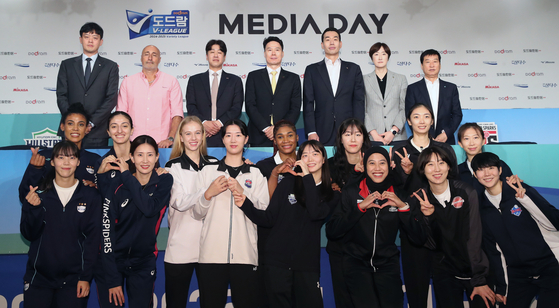 Women's V League players and head coaches pose for a photo during a media day event at K Hotel in southern Seoul on Wednesday. [NEWS1] 