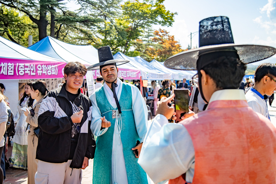 Students pose for a photo during the YU Global Culture Festival held at Yeungnam University on Thursday. [YEUNGNAM UNIVERSITY]