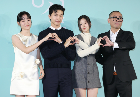 From left, actors Roh Yoon-seo, Hong Kyung, Kim Min-ju and director Jo Seon-ho pose for a photo during a press conference for film ″Hear Me: Our Summer″ held in Seongdong District, eastern Seoul, on Friday. [YONHAP]