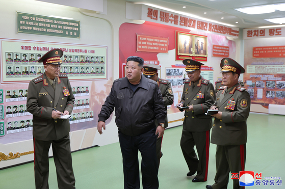 North Korean leader Kim Jong-un, center, inspects the 2nd Corps of the Korean People's Army on Thursday in a photo released by Korean Central News Agency (KCNA) the following day. [KOREAN CENTRAL NEWS AGENCY]