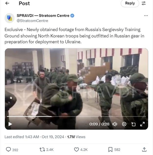 The footage posted on X, formerly Twitter, by the Centre for Strategic Communication and Information Security of Ukraine on Oct. 19 shows what appears to be North Korean soldiers receiving gear from Russian soldiers. [YONHAP]