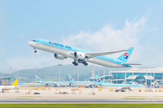 A Korean Air Boeing 787-10 takes off from an airfield. [KOREAN AIR] 