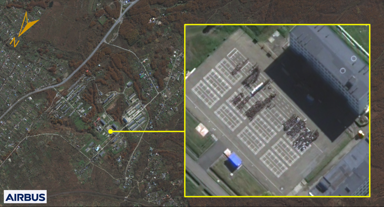 South Korea's National Intelligence Service on Friday released this satellite photograph, which it said shows North Korean troops gathered from training in Ussuriysk in the Russian Far East on Wednesday. [NATIONAL INTELLIGENCE SERVICE]