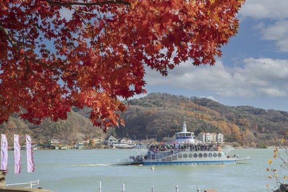 A cruise will be available on Nami Island on Thursdays and Fridays until Nov. 8, offering a 50-minute foliage-viewing experience from the water. [NAMI ISLAND]