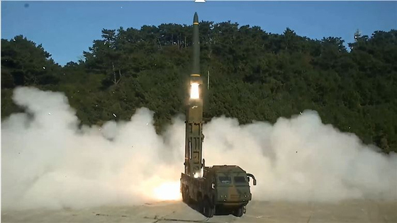 A Hyunmoo-II ballistic missile is fired from a transporter erector launcher in the western coastal county of Taean County, South Chungcheong, on Thursday. [JOINT CHIEFS OF STAFF]